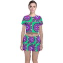 Purple shapes on a green background                        Crop Top and Shorts Co-Ord Set View1